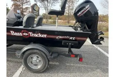 Slide: The Image of 2021 Bass Tracker Classic XL boat with Mercury engine on a trailer. - 4