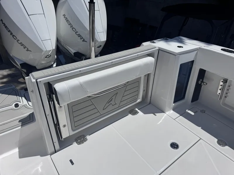 Slide: The Image of 2026 Blackfin 272 DC boat with Mercury engines, featuring a sleek, modern deck design. - 12