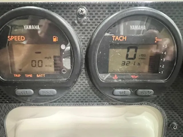 Slide: The Image of Dashboard of a 2005 Hydra-Sports 2500 VX with Yamaha speed and tachometer gauges. - 12