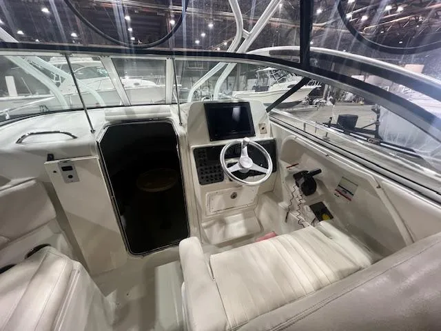 Slide: The Image of 2005 Hydra-Sports 2500 VX boat interior with steering wheel and control panel. - 4
