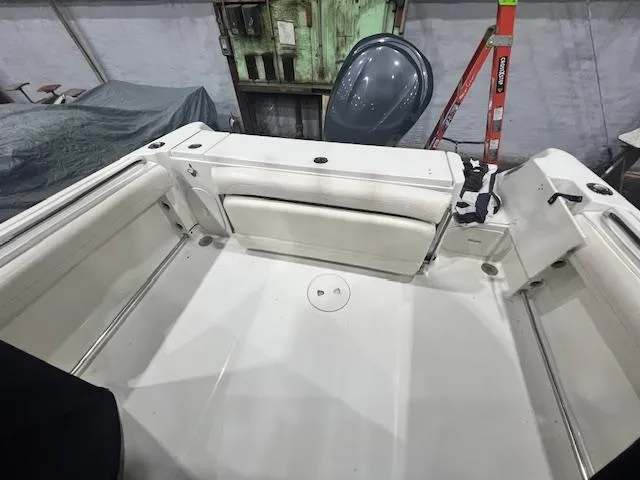 Slide: The Image of 2005 Hydra-Sports 2500 VX boat interior with seating and storage compartments. - 5