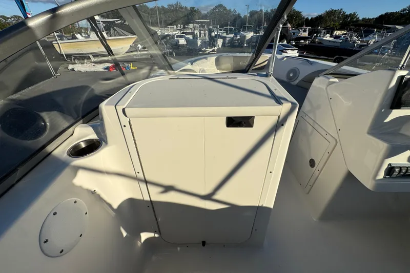 Slide: The Image of 2021 Key West 203 DFS boat interior with console and seating area. - 26