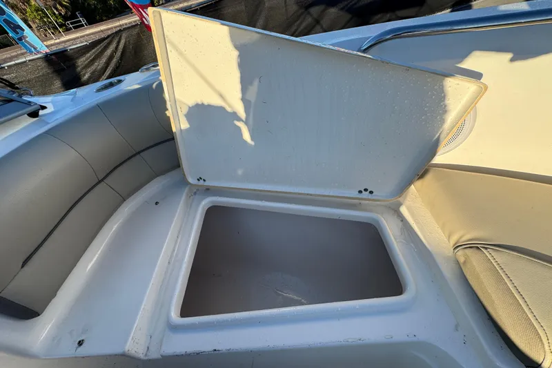 Slide: The Image of Open storage compartment on 2021 Key West 203 DFS boat, showcasing interior space. - 34