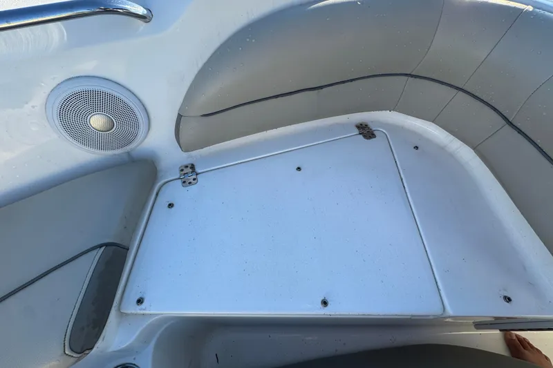 Slide: The Image of Interior of 2021 Key West 203 DFS boat showing speaker and storage compartment. - 35