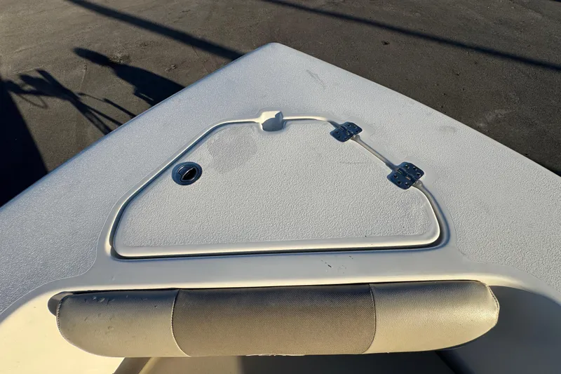 Slide: The Image of Bow of 2021 Key West 203 DFS boat with storage compartment and cushion. - 37