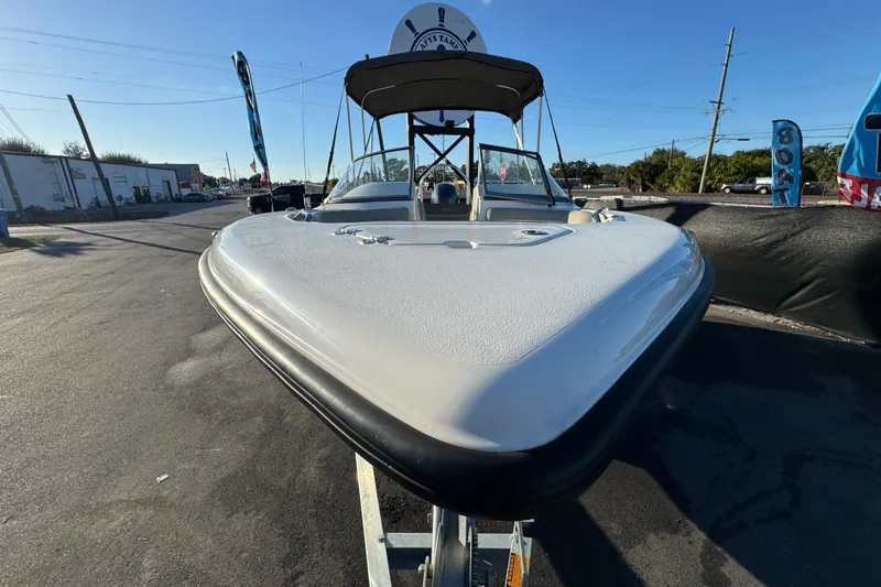 Slide: The Image of 2021 Key West 203 DFS boat on trailer, sunny day, outdoor display. - 4