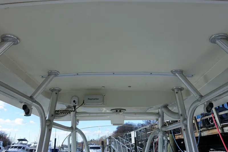 Slide: The Image of 2007 Hydra-Sports Vector 2900 CC dashboard with navigation screens and controls. - 13