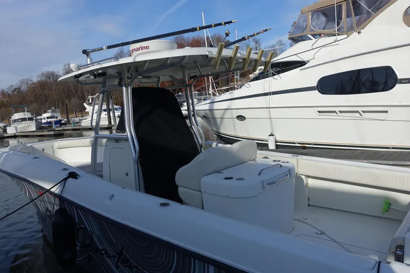 Slide: The Image of 2007 Hydra-Sports Vector 2900 CC boat docked with Evinrude engines. - 17