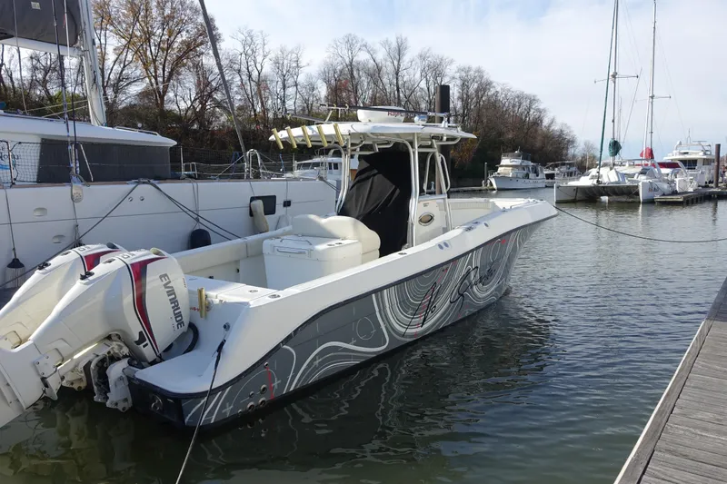 Slide: The Image of 2007 Hydra-Sports Vector 2900 CC boat docked at marina with twin outboard engines. - 18