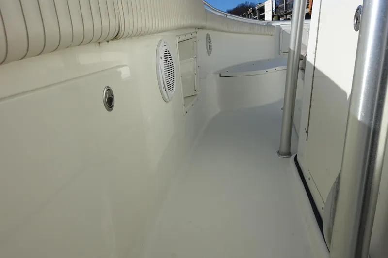 Slide: The Image of 2007 Hydra-Sports Vector 2900 CC boat interior with white seating and storage compartments. - 6