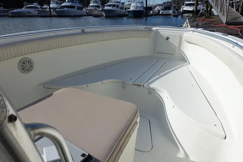 Slide: The Image of 2007 Hydra-Sports Vector 2900 CC boat interior at dock, featuring spacious seating area. - 8