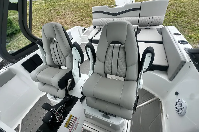 Slide: The Image of Luxury seating on the 2026 Monterey Elite 25 OB boat, featuring modern design and comfort. - 19