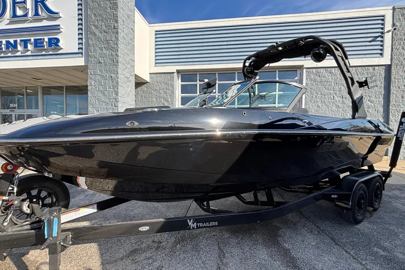 Slide: The Image of 2026 MB B52 23 Classic boat on trailer outside dealership. - 36