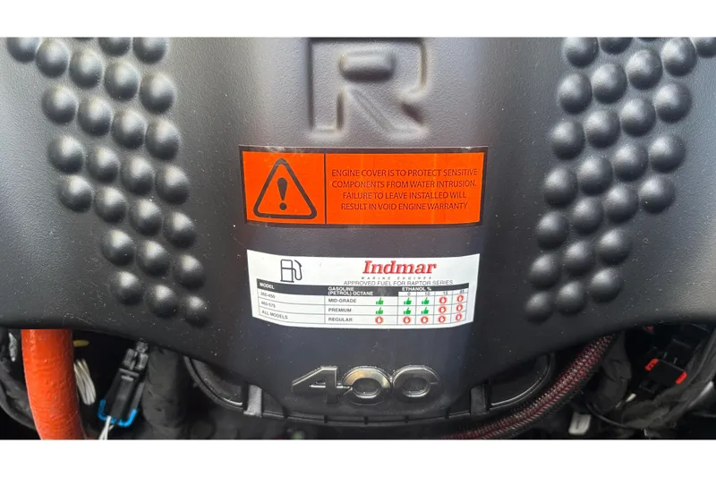 Slide: The Image of Engine cover of 2026 MB B52 23 Classic with Indmar label and warning sign. - 7
