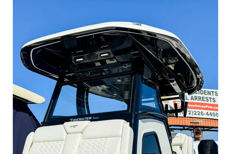 Slide: The Image of 2026 Tidewater 3100 Carolina Bay boat with sleek design and modern features. - 13