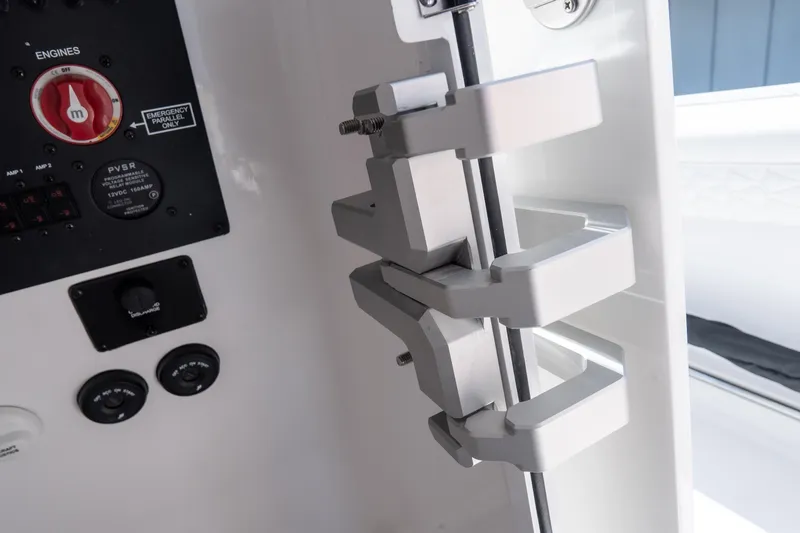 Slide: The Image of Control panel and rod holder on 2026 Tidewater 3100 Carolina Bay boat. - 20