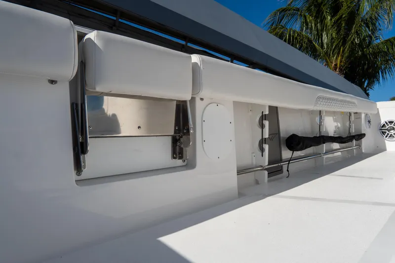 Slide: The Image of 2026 Tidewater 3100 Carolina Bay boat interior with seating and storage features. - 28