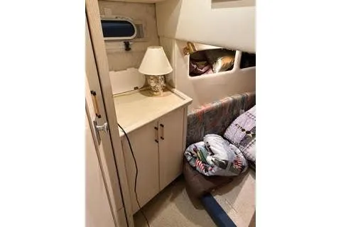 Slide: The Image of Kitchen area of 1997 Bayliner 3788 Command Bridge Motoryacht with stove and microwave. - 10