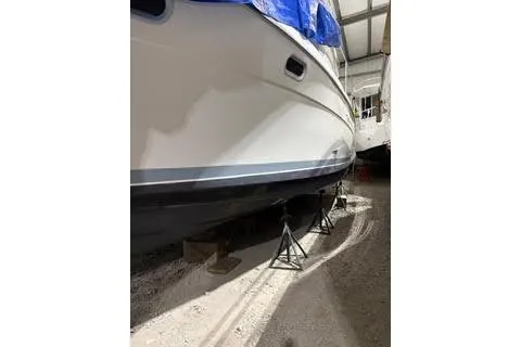 Slide: The Image of Interior of 1997 Bayliner 3788 Command Bridge Motoryacht with kitchen and seating area. - 2