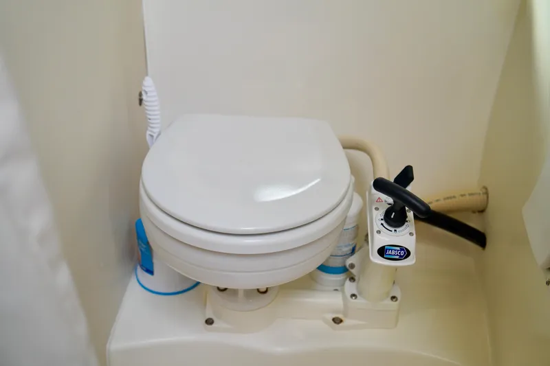 Slide: The Image of 2006 Bayliner 285 boat bathroom with Jabsco marine toilet. - 30