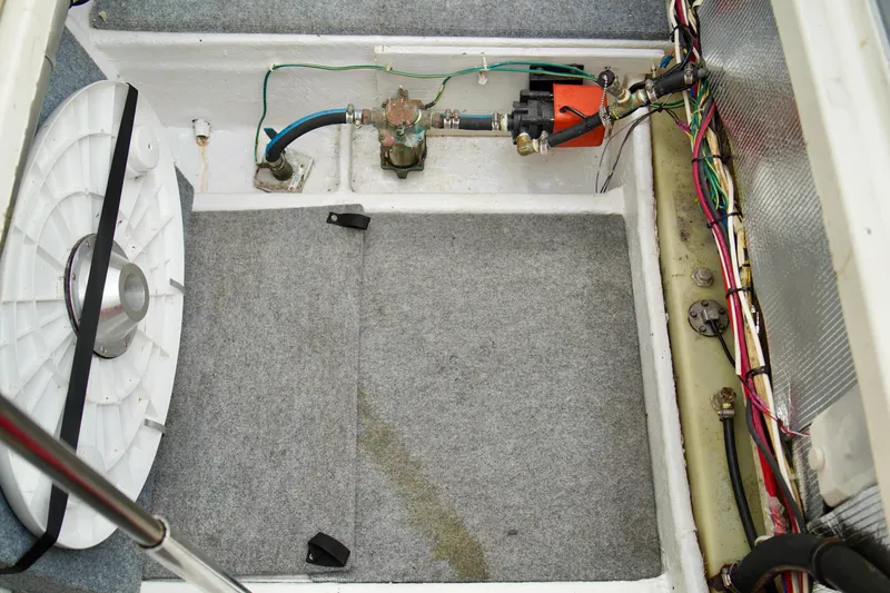 Slide: The Image of Engine compartment of a 2006 Bayliner 285 boat, showing wiring and components. - 39