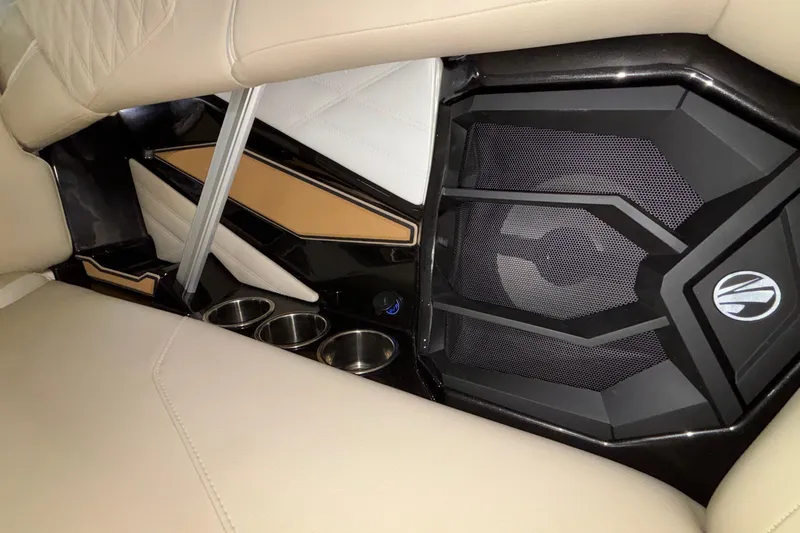 Slide: The Image of 2026 Tigé 22RZX interior with premium speaker and cup holders. - 22