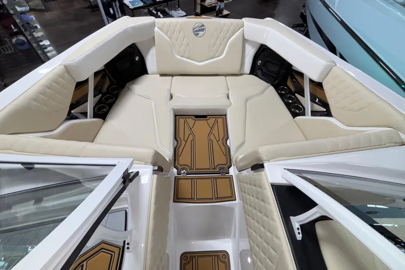 Slide: The Image of 2026 Tigé 22RZX boat interior with beige seating and stylish flooring. - 33