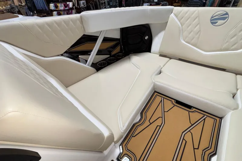 Slide: The Image of Luxurious interior of 2026 Tigé 22RZX boat with beige seating and stylish flooring. - 34