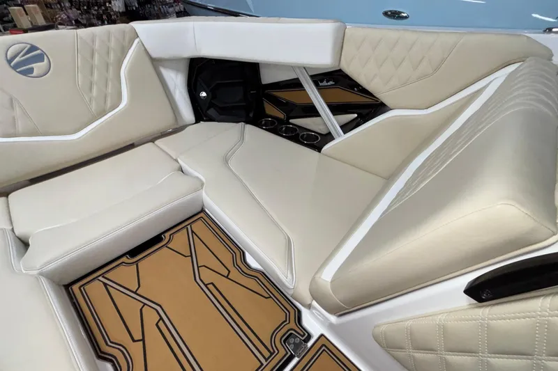 Slide: The Image of Luxurious interior of 2026 Tigé 22RZX boat with beige seating and stylish flooring. - 36