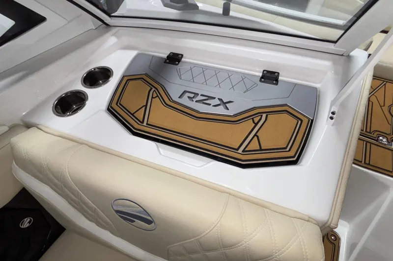 Slide: The Image of 2026 Tigé 22RZX boat interior with stylish dashboard and cup holders. - 39