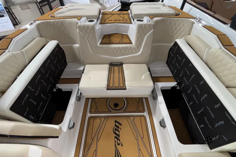 Slide: The Image of Luxurious interior of 2026 Tigé 22RZX boat with beige seating and stylish flooring. - 41