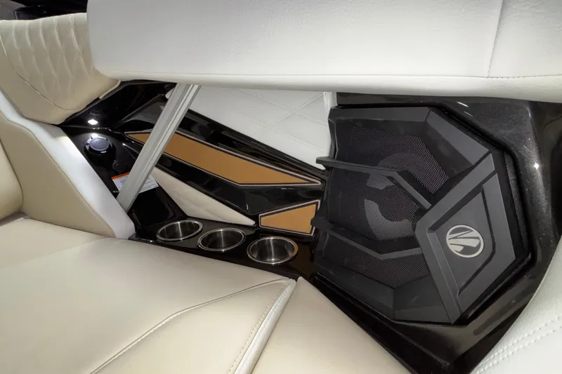 Slide: The Image of 2026 Tigé 22RZX interior with premium seating, cup holders, and integrated speaker system. - 55