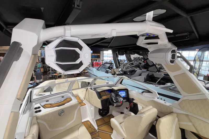 Slide: The Image of Interior of 2026 Tigé 22RZX boat showcasing modern dashboard and seating. - 58