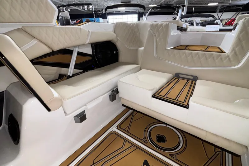 Slide: The Image of Luxurious interior of 2026 Tigé 22RZX boat with beige seating and stylish flooring. - 61