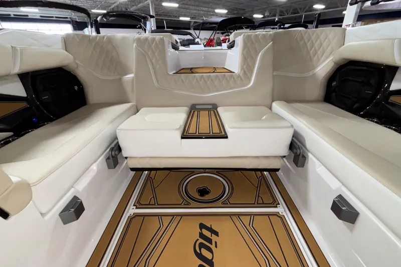 Slide: The Image of Interior of 2026 Tigé 22RZX boat with luxurious seating and stylish flooring. - 62