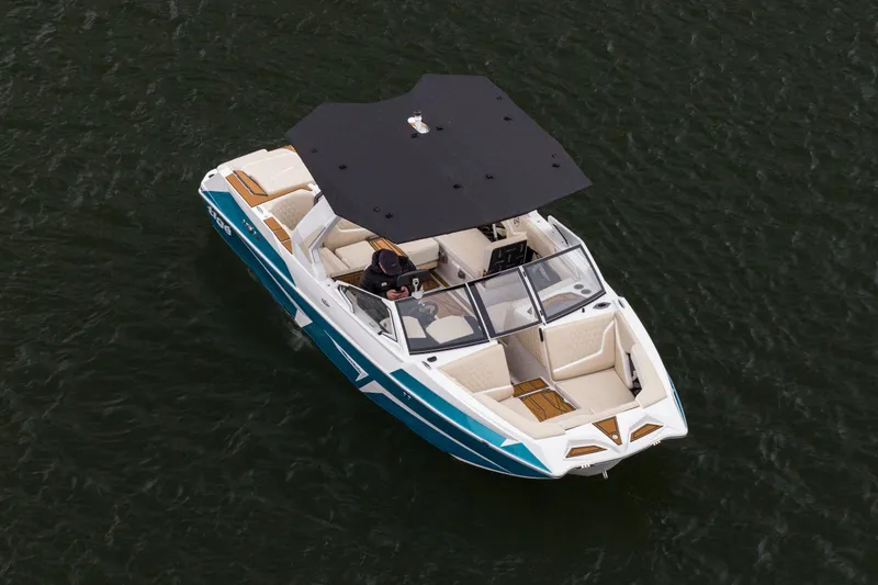 Slide: The Image of 2026 Tigé 22RZX boat on water, featuring sleek design and spacious seating. - 7