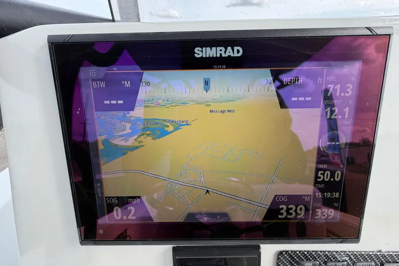 Slide: The Image of Open storage compartment on a 2018 Blue Wave 2800 Pure Hybrid boat. - 26