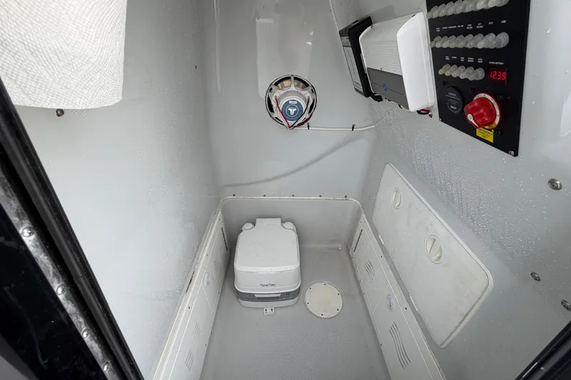 Slide: The Image of 2018 Blue Wave 2800 Pure Hybrid boat controls and dashboard close-up. - 34