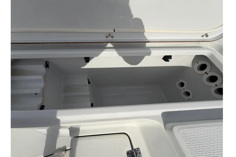 Slide: The Image of 2018 Blue Wave 2800 Pure Hybrid boat interior with seating and console details. - 41