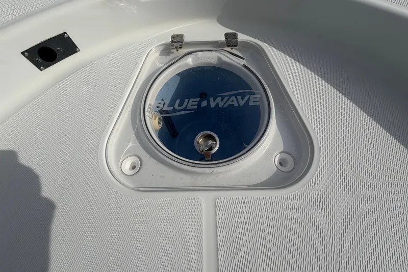 Slide: The Image of 2018 Blue Wave 2800 Pure Hybrid boat storage compartments with secure latches. - 50