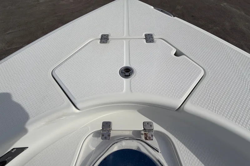 Slide: The Image of 2018 Blue Wave 2800 Pure Hybrid boat deck with storage compartments and cushioned seating. - 52