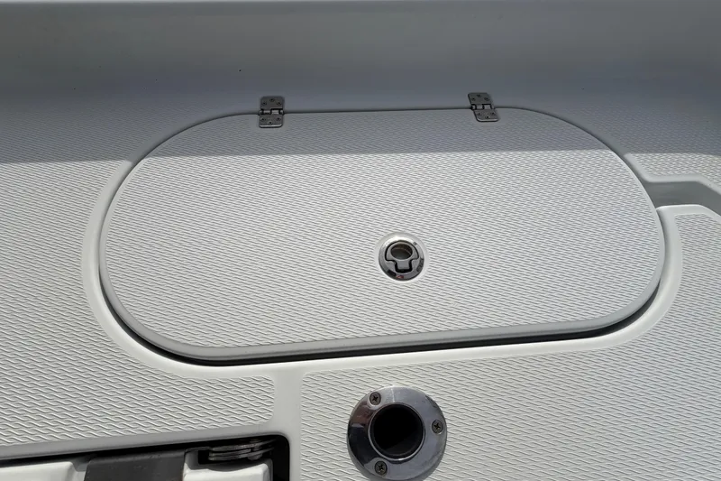 Slide: The Image of White cooler with cushioned seat on 2018 Blue Wave 2800 Pure Hybrid boat. - 67