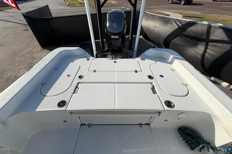Slide: The Image of 2018 Blue Wave 2800 Pure Hybrid boat with Suzuki 350 engine, rear deck view. - 73