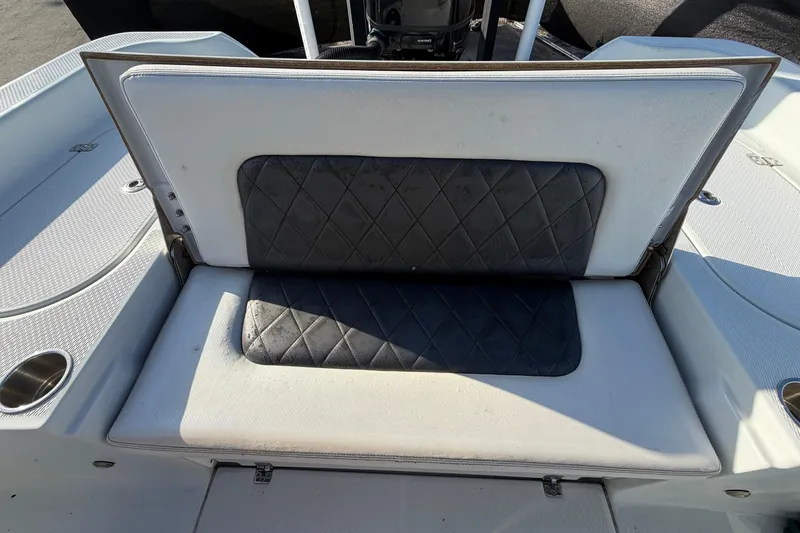 Slide: The Image of 2018 Blue Wave 2800 Pure Hybrid boat seat with diamond-patterned upholstery. - 75