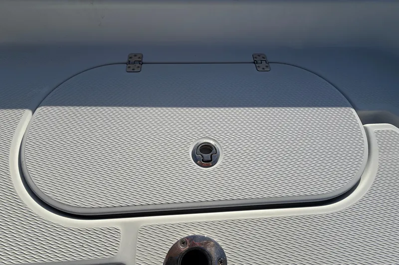 Slide: The Image of 2018 Blue Wave 2800 Pure Hybrid boat hatch with textured surface and metal hinges. - 77