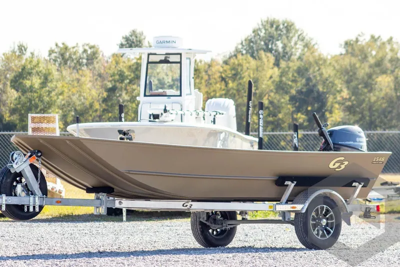 The Image of 2026 G3 Gator Tough 1548 VBW boat on trailer, outdoors. - 1