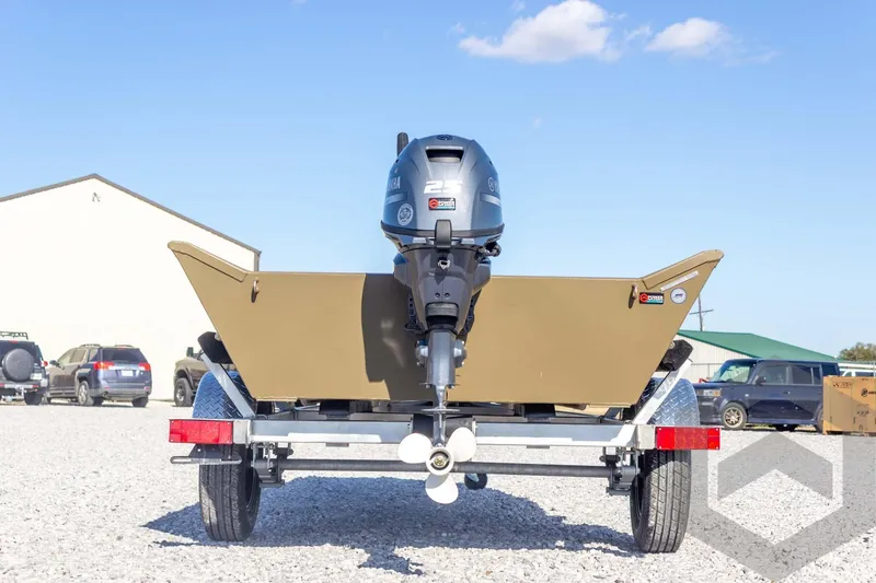 Slide: The Image of 2026 G3 Gator Tough 1548 VBW boat on trailer, rear view with motor. - 15