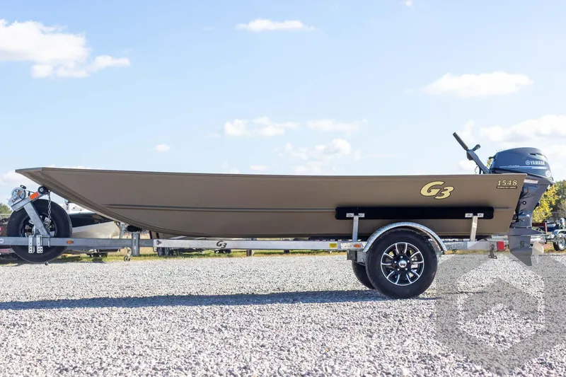 Slide: The Image of 2026 G3 Gator Tough 1548 VBW boat on trailer, outdoors, side view. - 17