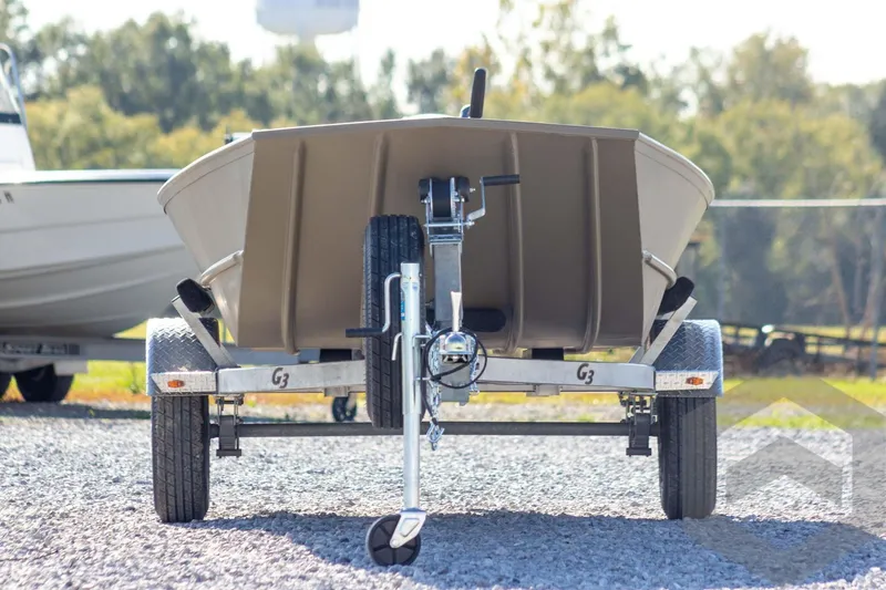 Slide: The Image of 2026 G3 Gator Tough 1548 VBW boat on trailer, parked outdoors. - 2