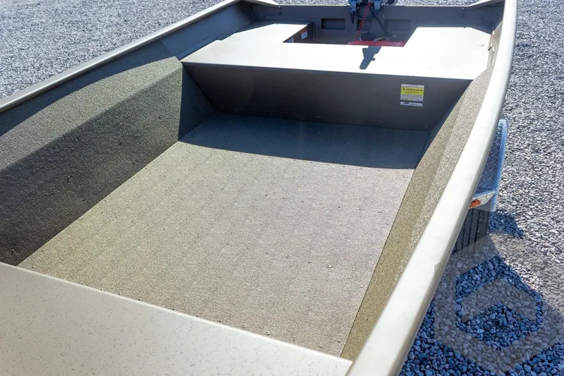 Slide: The Image of 2026 G3 Gator Tough 1548 VBW boat interior with textured flooring. - 24